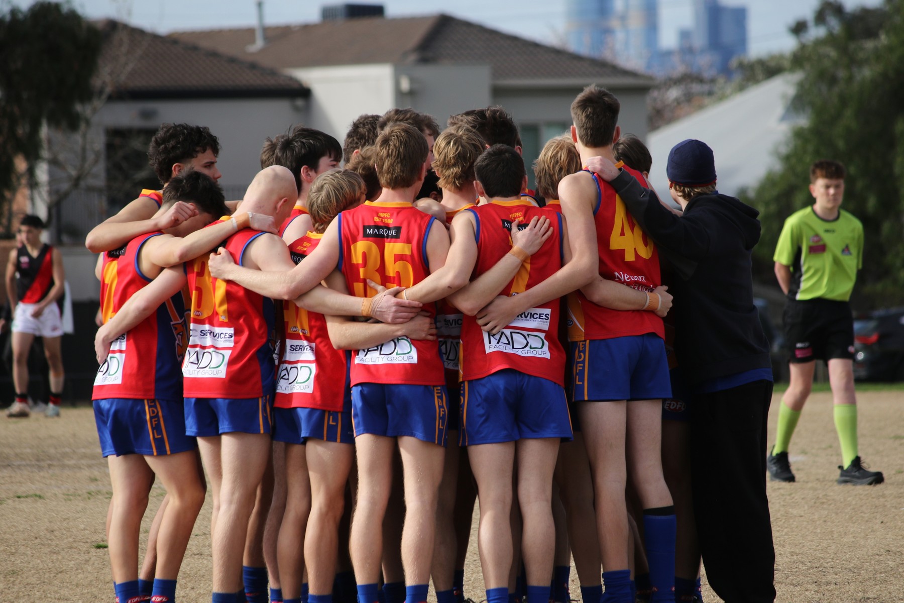 Marby players together in a team huddle